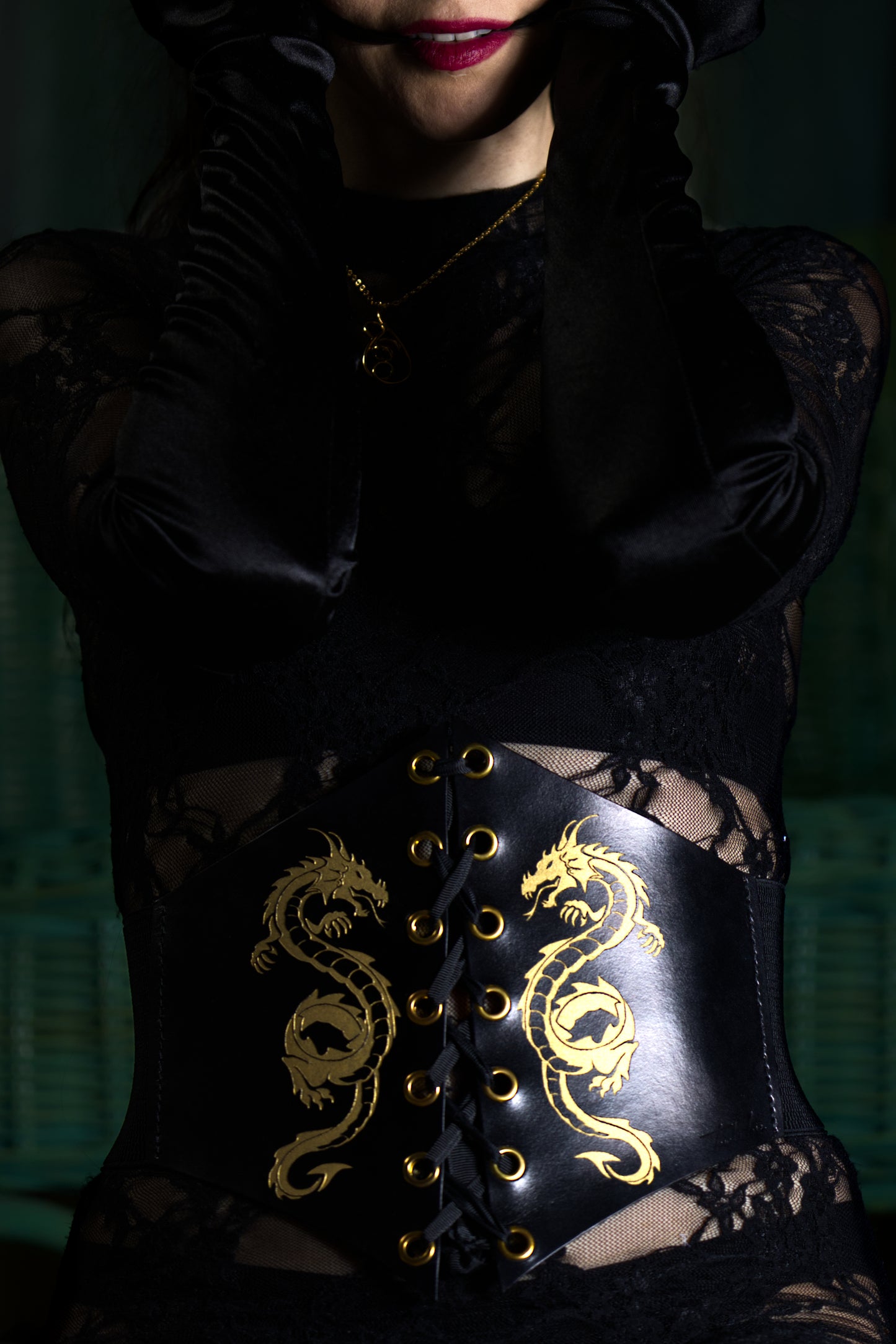 Close-up of vegetable-tanned, non-toxic leather corset with burnished edges, worn by dominatrix