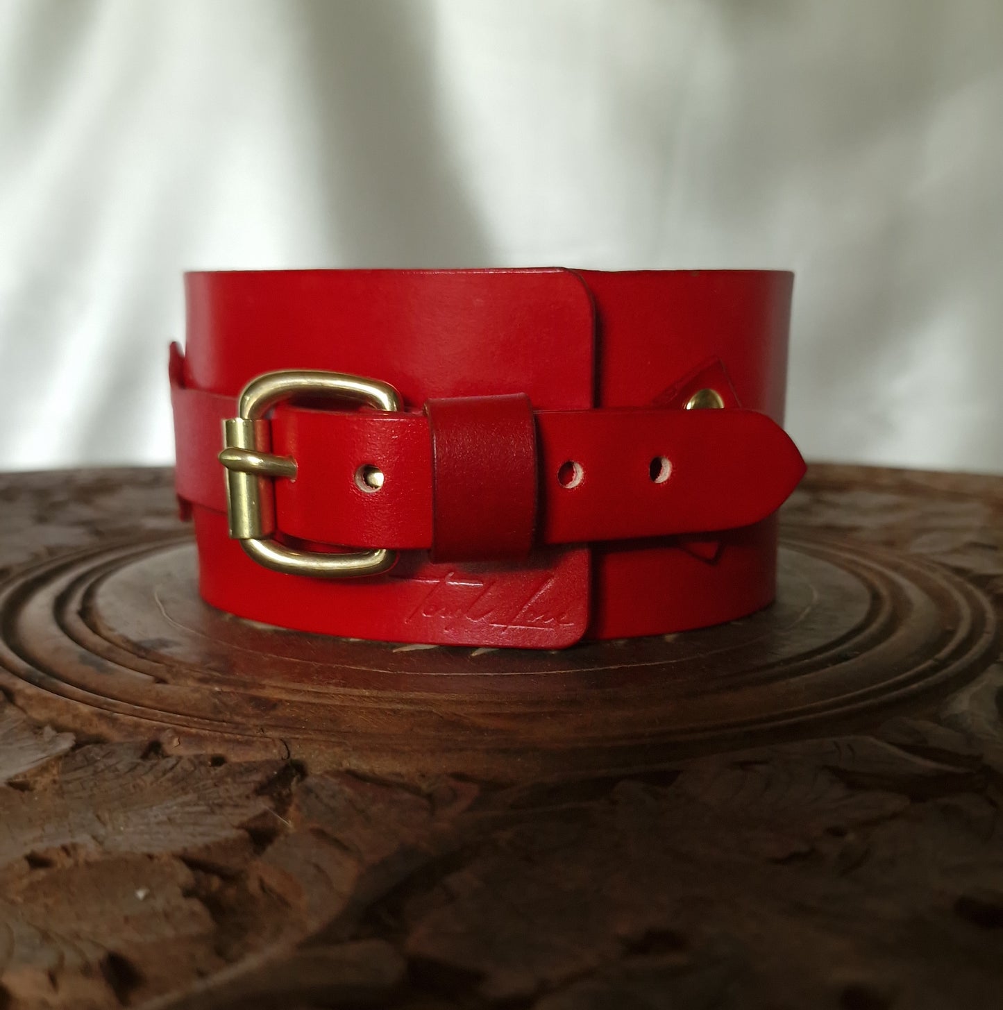 backside profile of engraved leather collar with d-ring. Solid Brass buckle. Fine leathercraft.