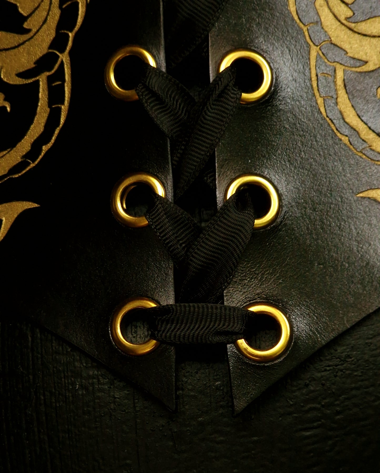 Hand-stitched BDSM leather corset with durable front lacing and gold hardware