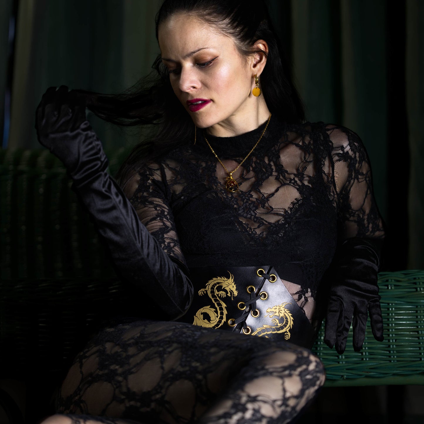 Hand-painted BDSM leather corset with golden dragon worn by dominant woman – custom handmade eco-friendly fetishwear