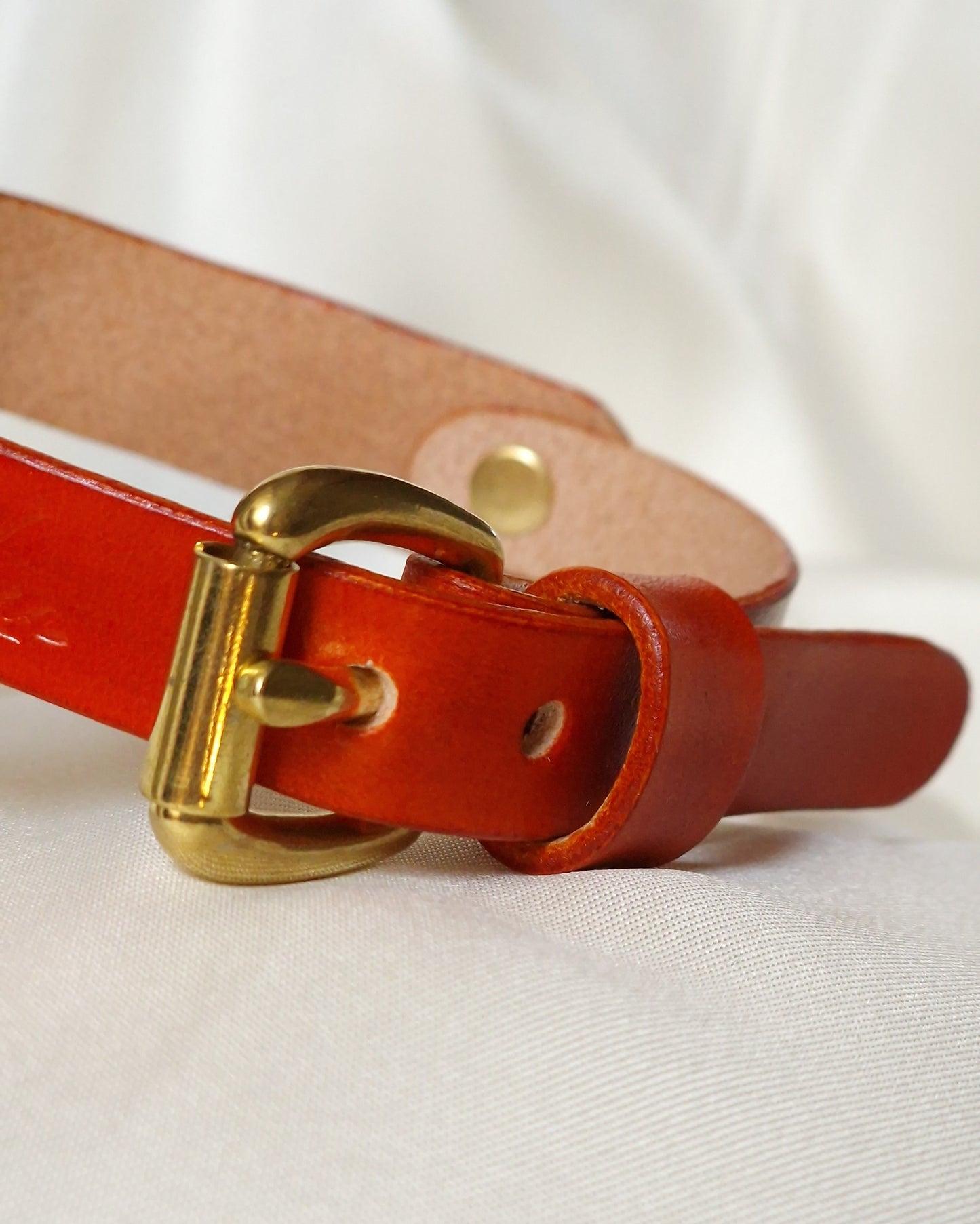 Back closure of handmade leather choker with adjustable fit