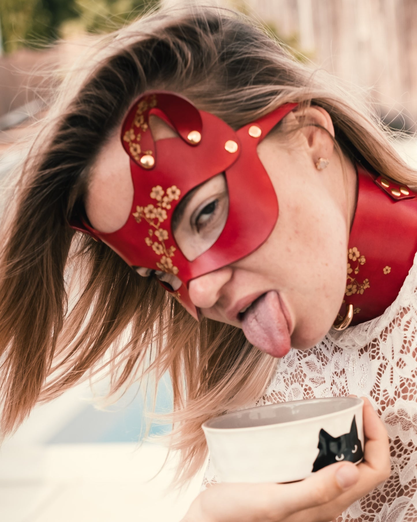 Hand-sculpted feline leather mask for BDSM/pet play, shaped.