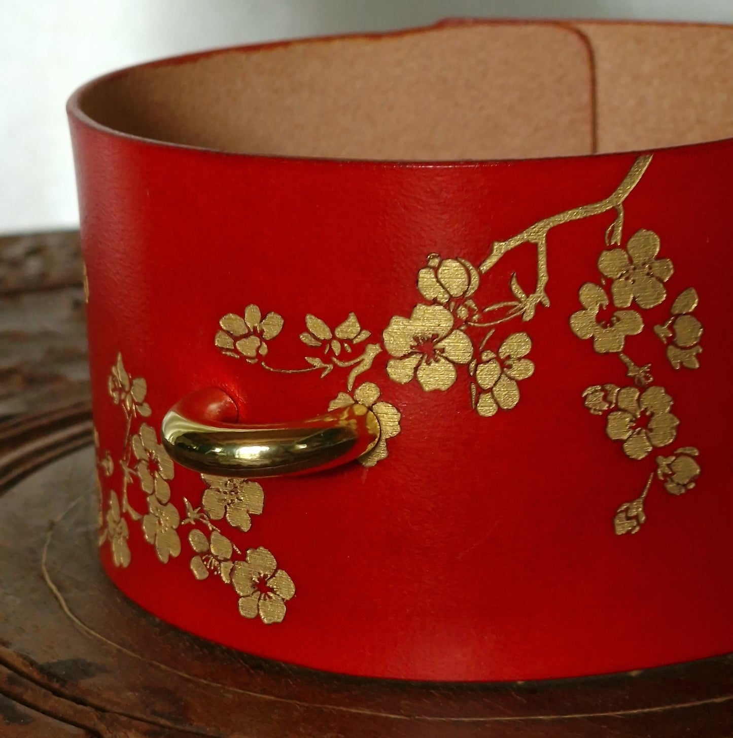 Veg-tanned bdsm fetish choker with cherry blossom ornament. Luxurious leather. Handmade.