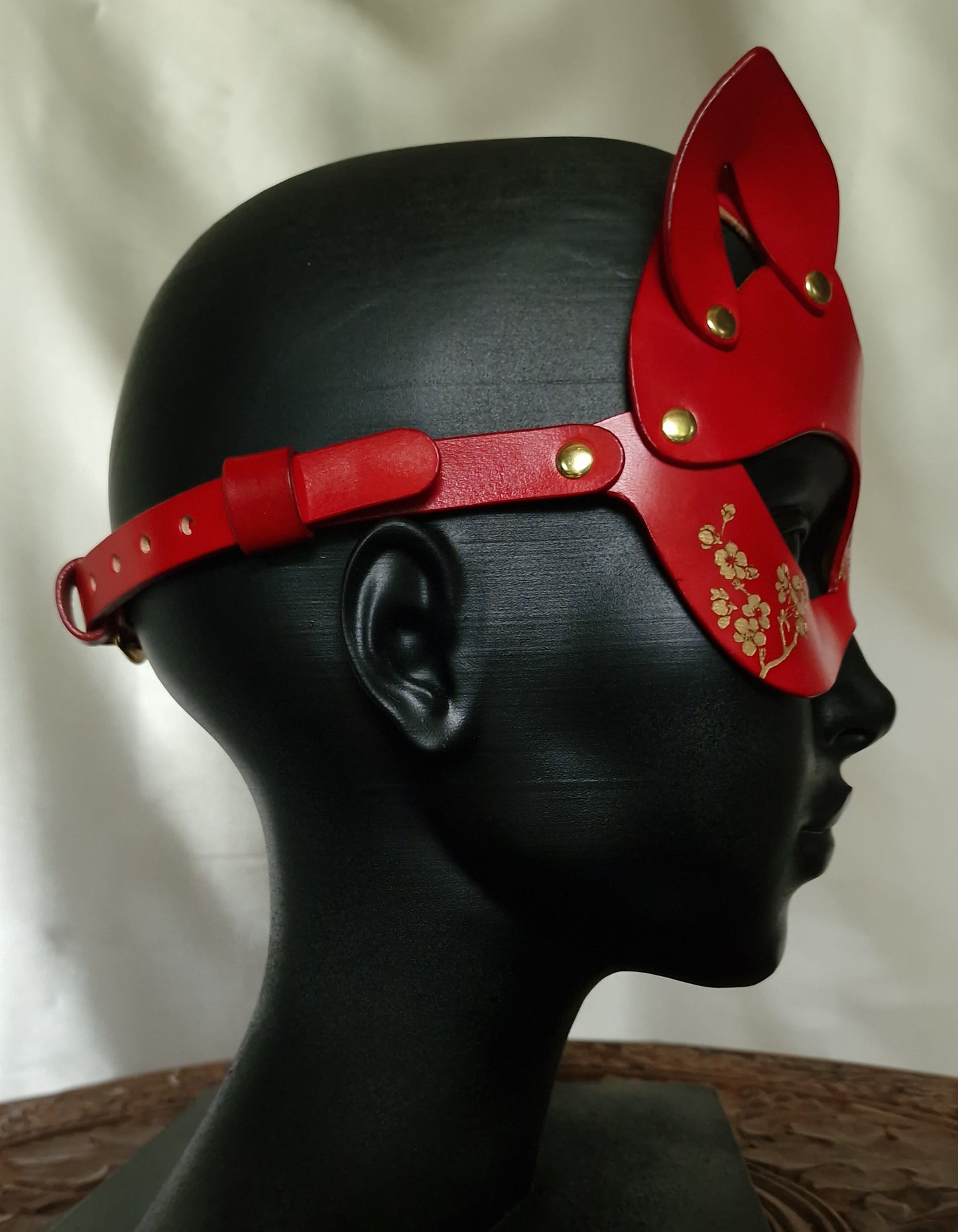 Sakura Feline Cat mask with floral golden blossom. Asian-east-inspired cherry blossom ornaments.
