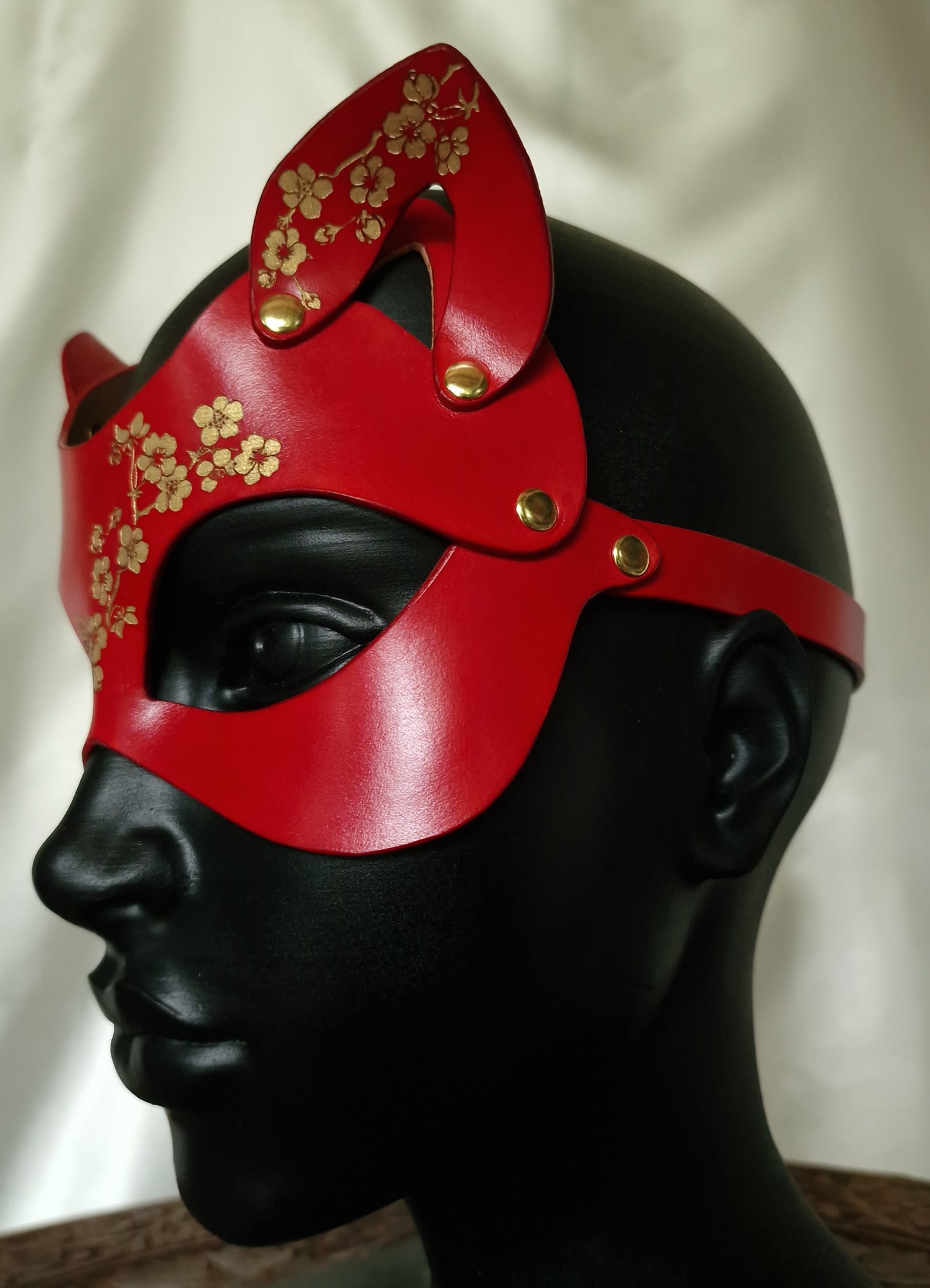 Leather cat mask for role play and bdsm fashion styling.