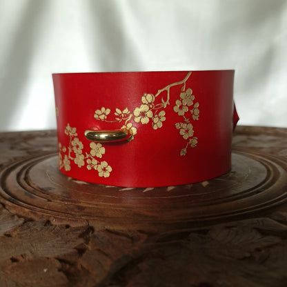 Leash-ready sakura collar with ornament.
