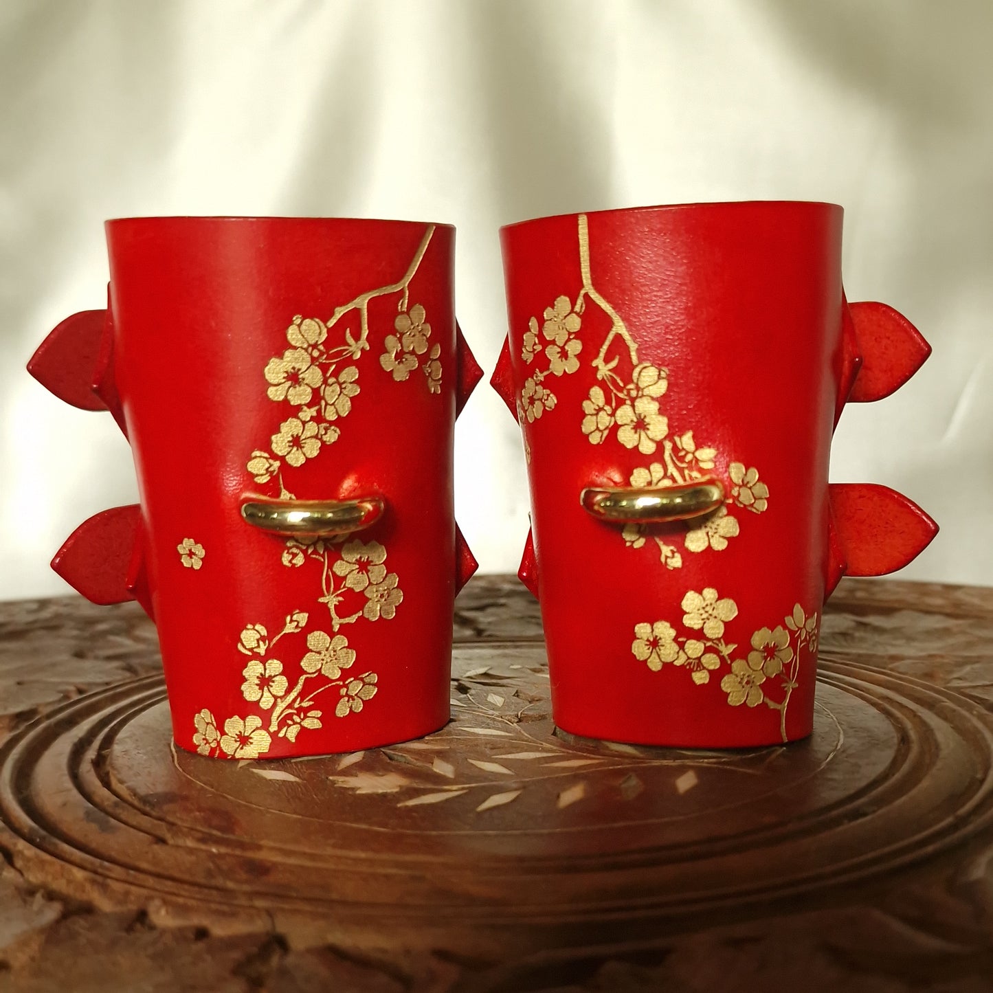 Hand-dyed veg-tanned handcuffs for BDSM restraint, gold or silver hardware. Gold or silver flowers. Geisha BDSM.