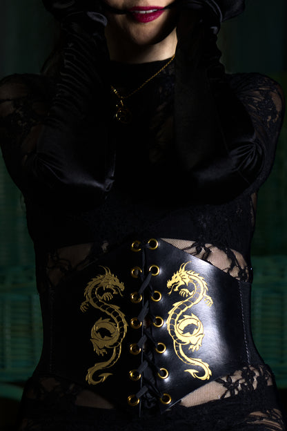 Close-up of vegetable-tanned, non-toxic leather corset with burnished edges, worn by dominatrix
