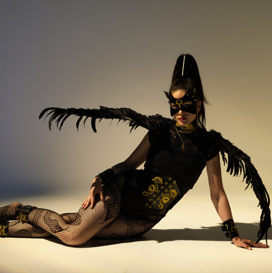 Dragon full body leather costume—mask, corset, choker, wrist & ankle cuffs.