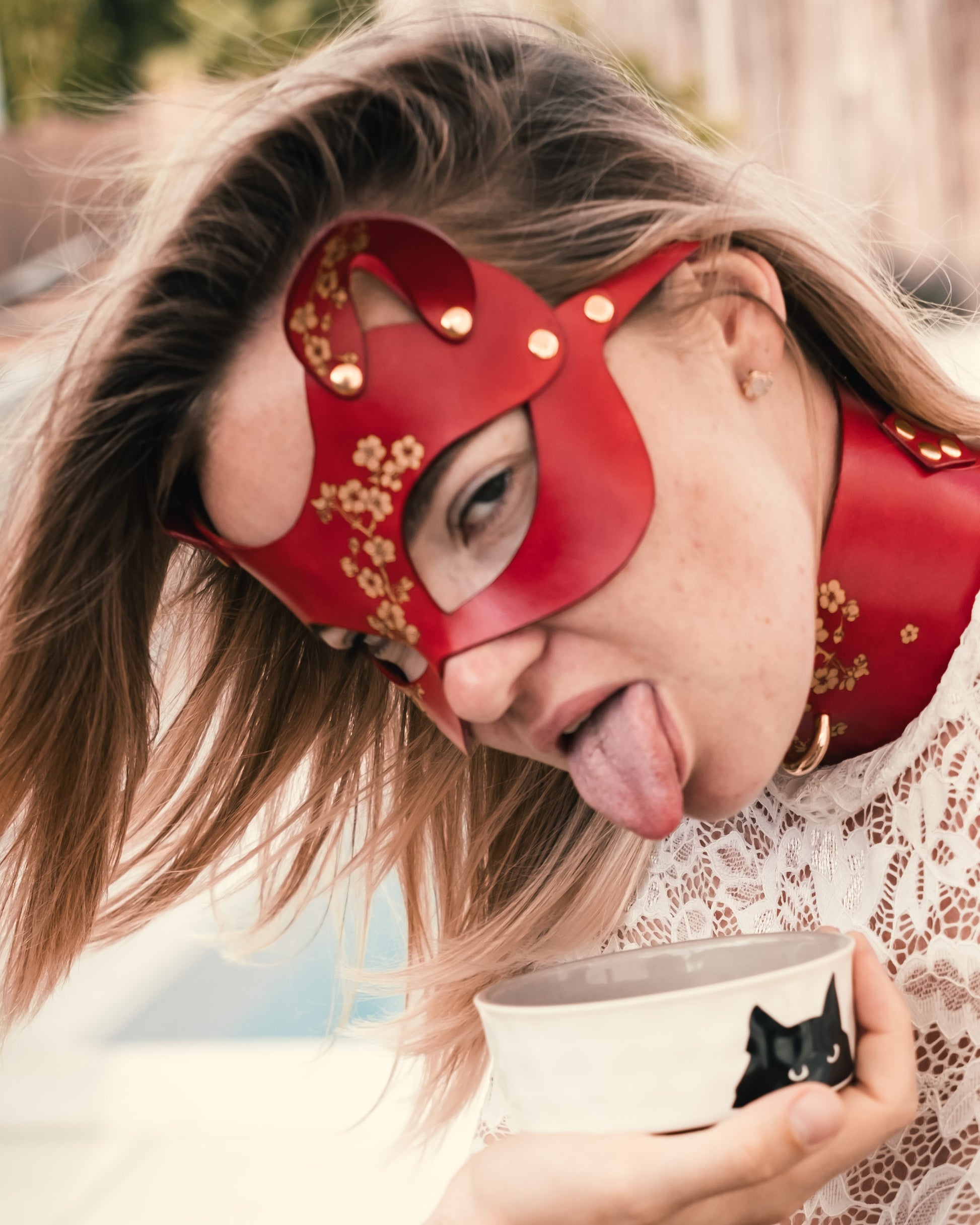 Hand-sculpted feline leather mask for BDSM/pet play, shaped.