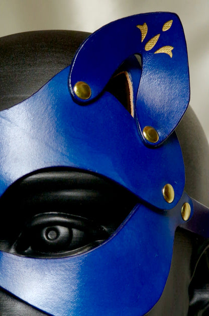 Fetish feline mask with high-end ornamental flourishes for queen, femdom, or dominatrix.