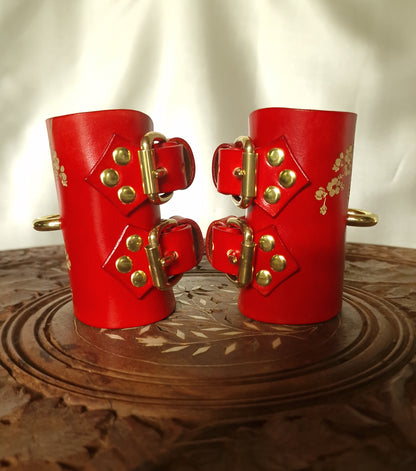 Side profile of sakura leather cuffs, skin-safe interior. Solid Brass buckles. Silver Hardware Optional.